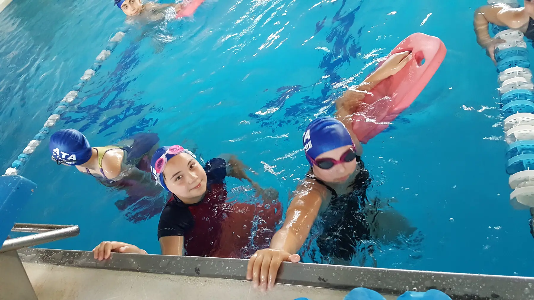 Children running with swimming board