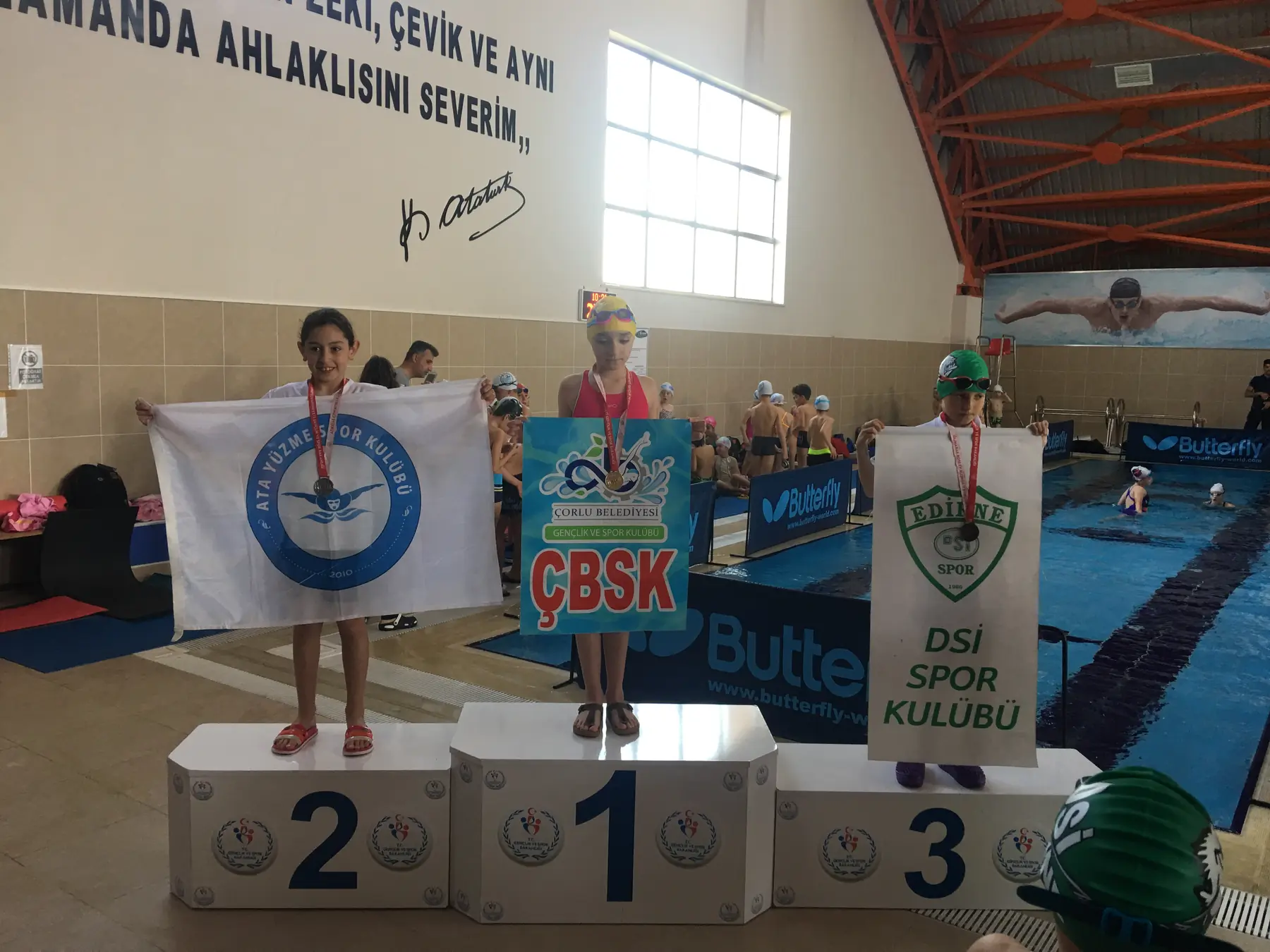 Ata Swimming athletes on the podium